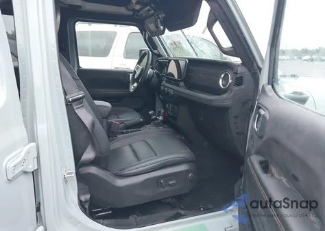 2024 Jeep Wrangler 4-Door Sahara 4X4 z USA, uszkodzony, nr VIN 1C4PJXEN9RW113142